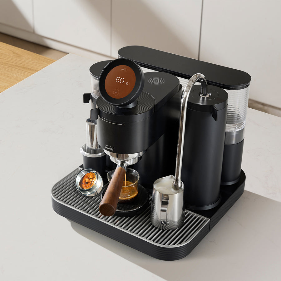 Meraki Gen 2 espresso machines in white and black on a kitchen bench